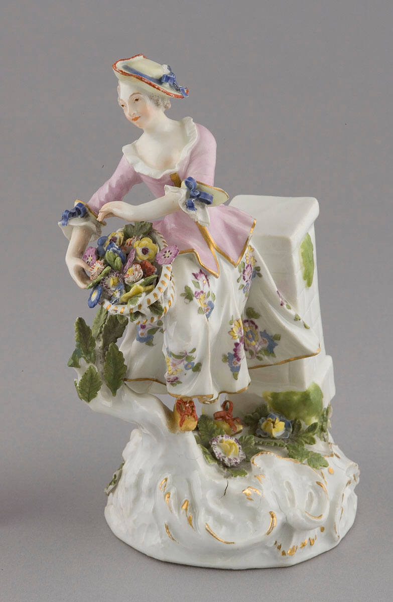 Woman with Basket of Flowers