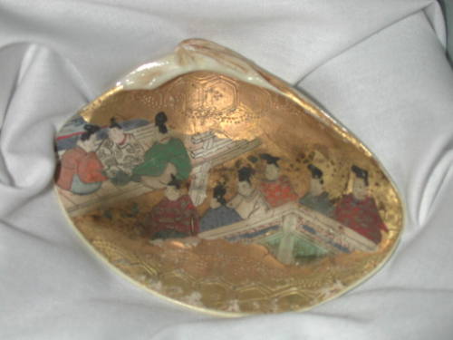 Clam Shells Decorated with Scenes of a Tale