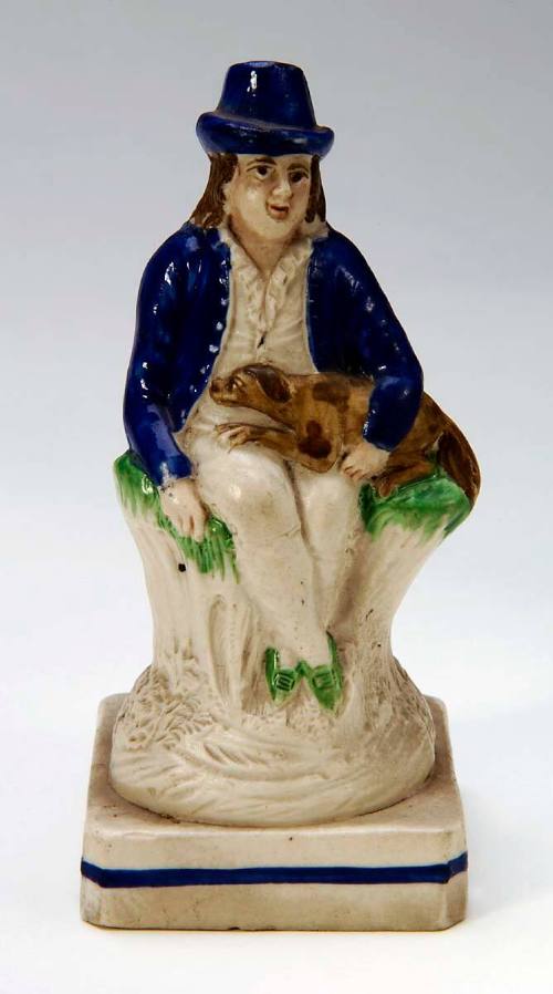 Figure of a Man Seated on a Tree Trunk