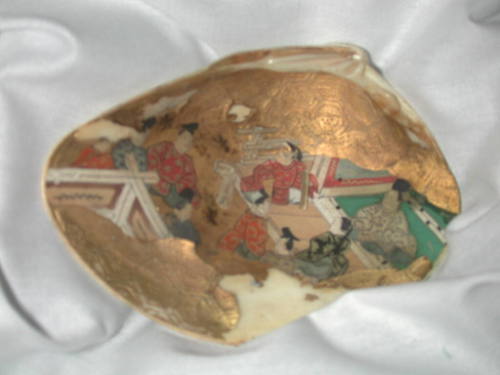 Clam Shells Decorated with Scenes of a Tale