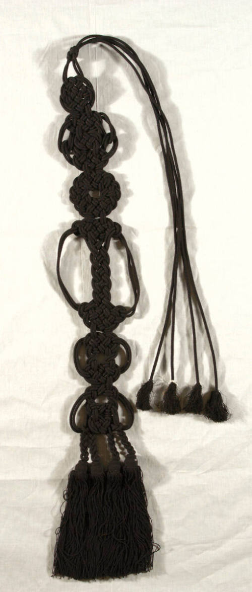 Buddhist monk's black tassels
