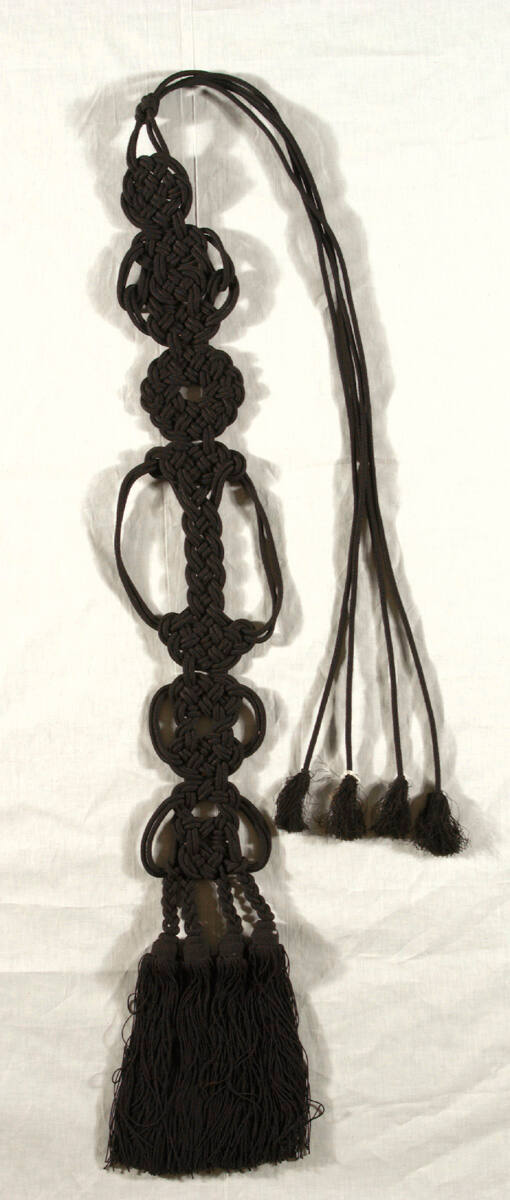 Buddhist monk's black tassels