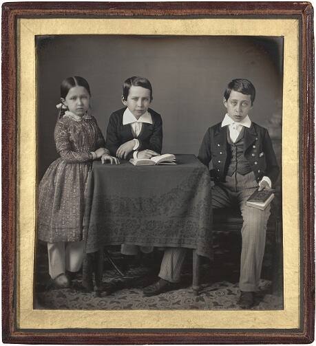 Three Children at Table