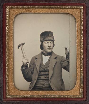 Man with Hammer and Nail