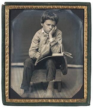 Boy on Bench with Book