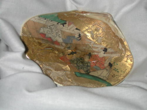 Clam Shells Decorated with Scenes of a Tale
