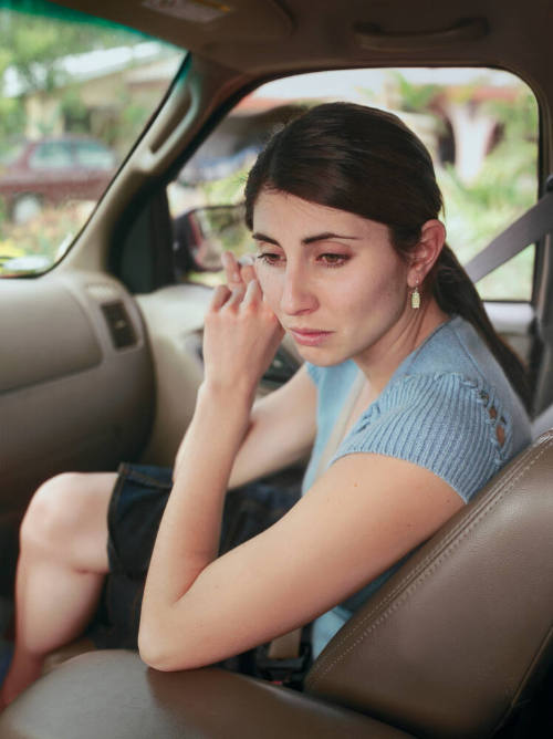 Kate Fixing Her Earring