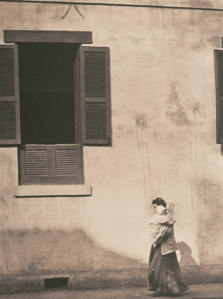 Woman Carrying Child