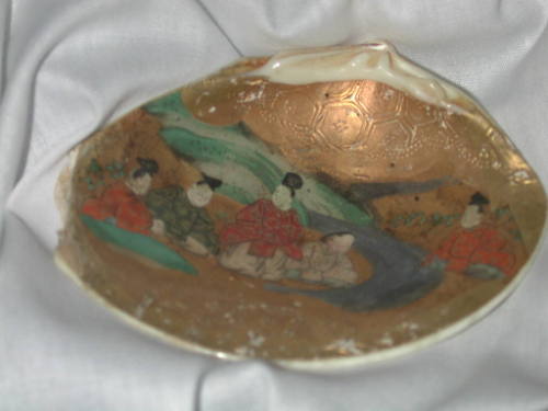 Clam Shells Decorated with Scenes of a Tale