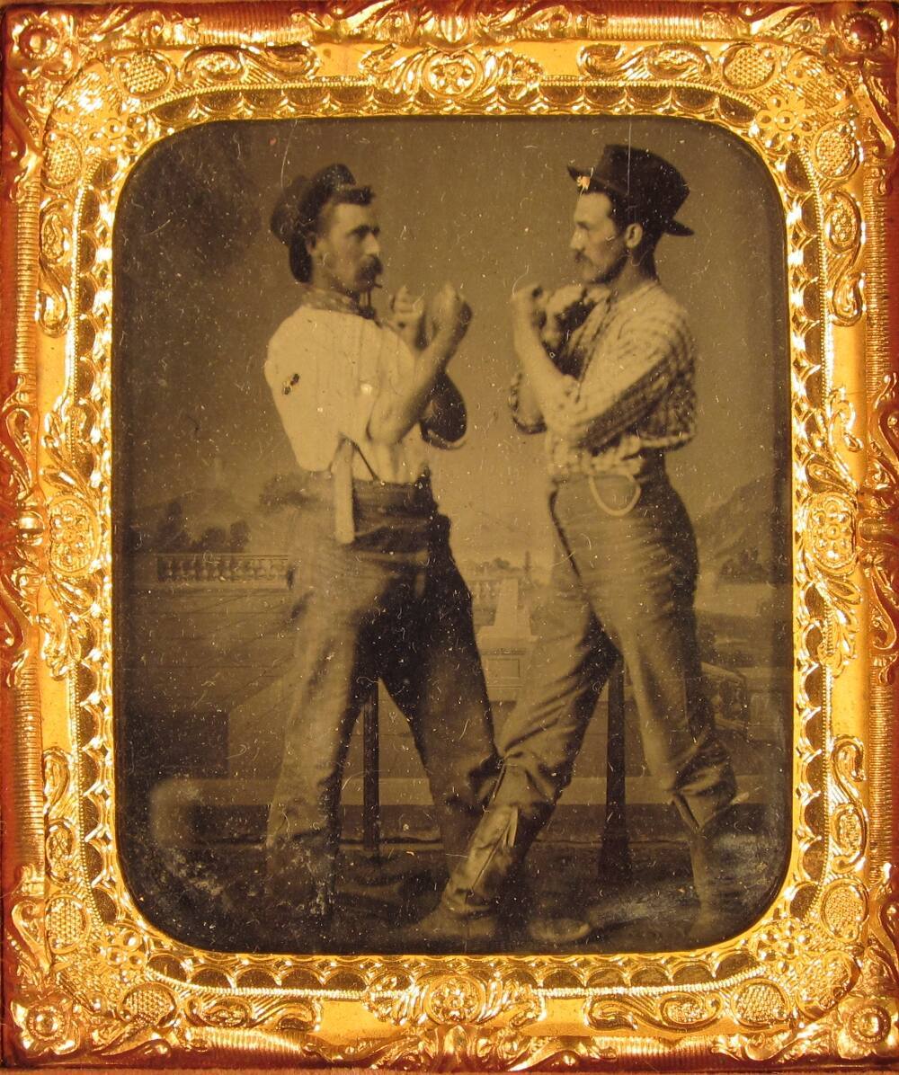 Men Pretending to Box