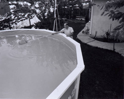 I bought the Doughboy pool for David and the kids and now no one wants to take the responsibility for cleaning it.