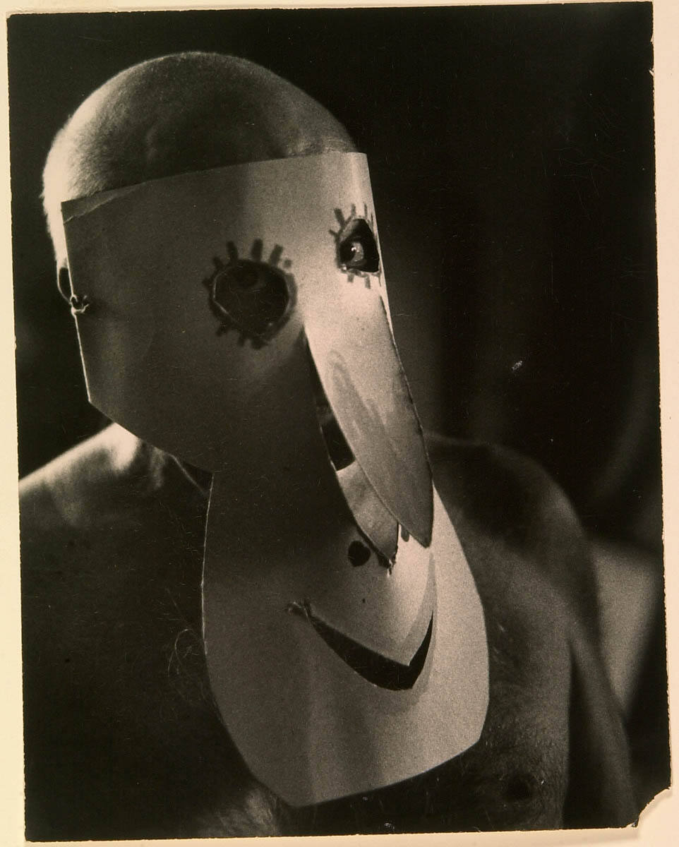 Picasso Wearing Cardboard Mask