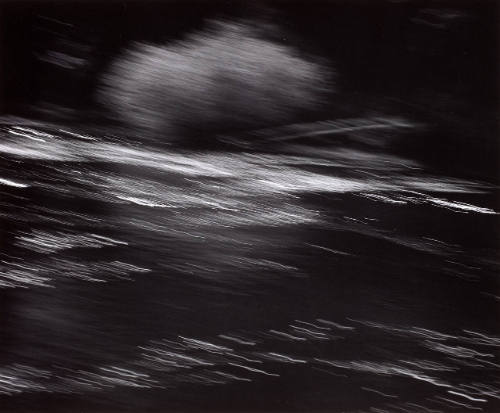 Foam on Water in Motion