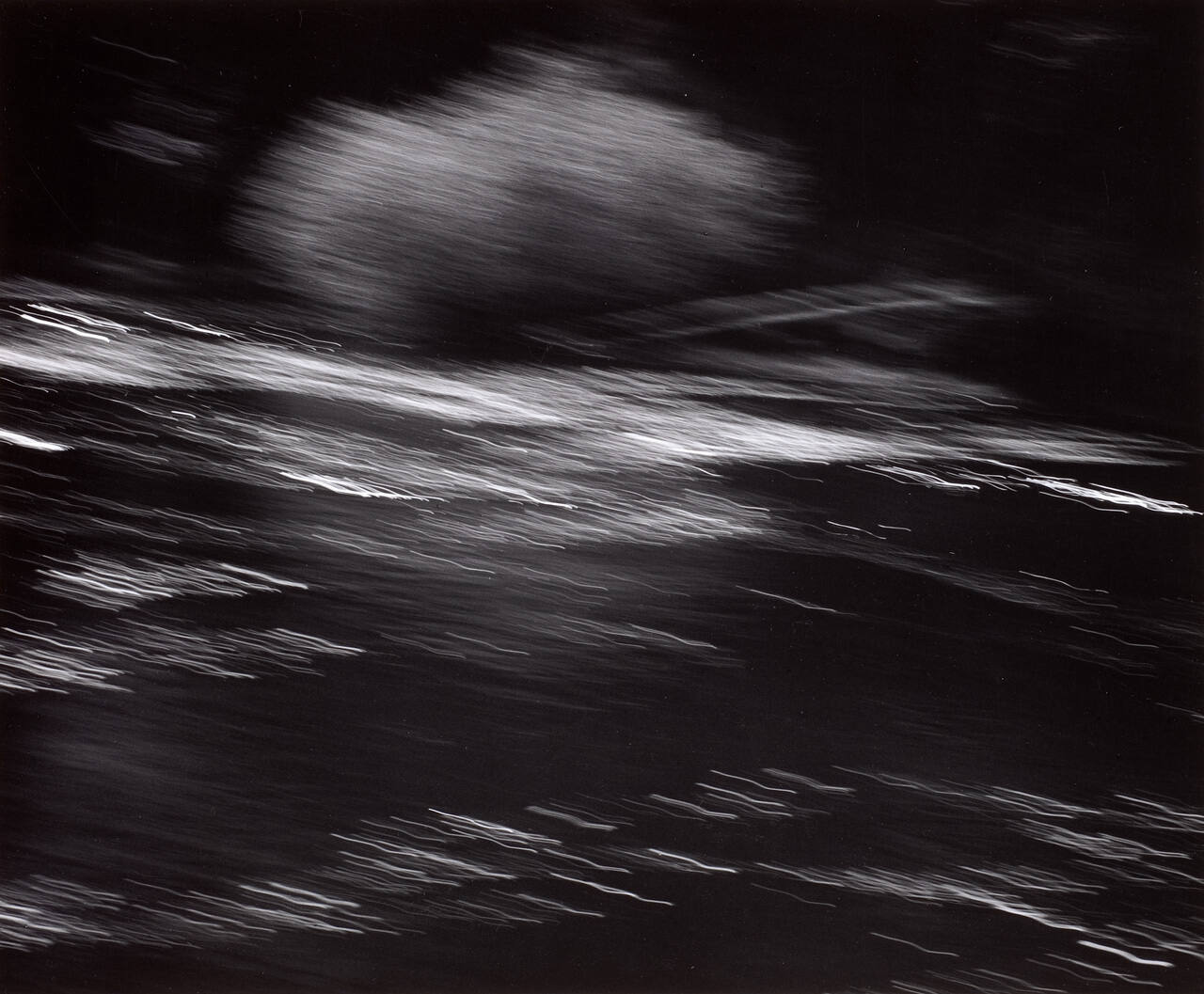 Foam on Water in Motion