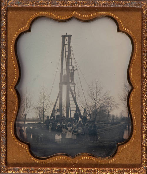 Children standing with pile driver