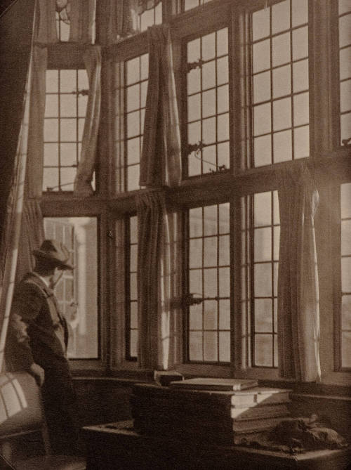 Untitled (Man Looking out Window)
