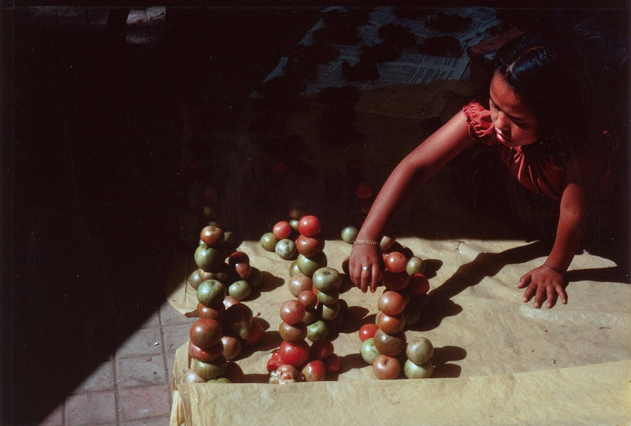 Patzcuaro Market  (Hispanic Girl with tomatoes)