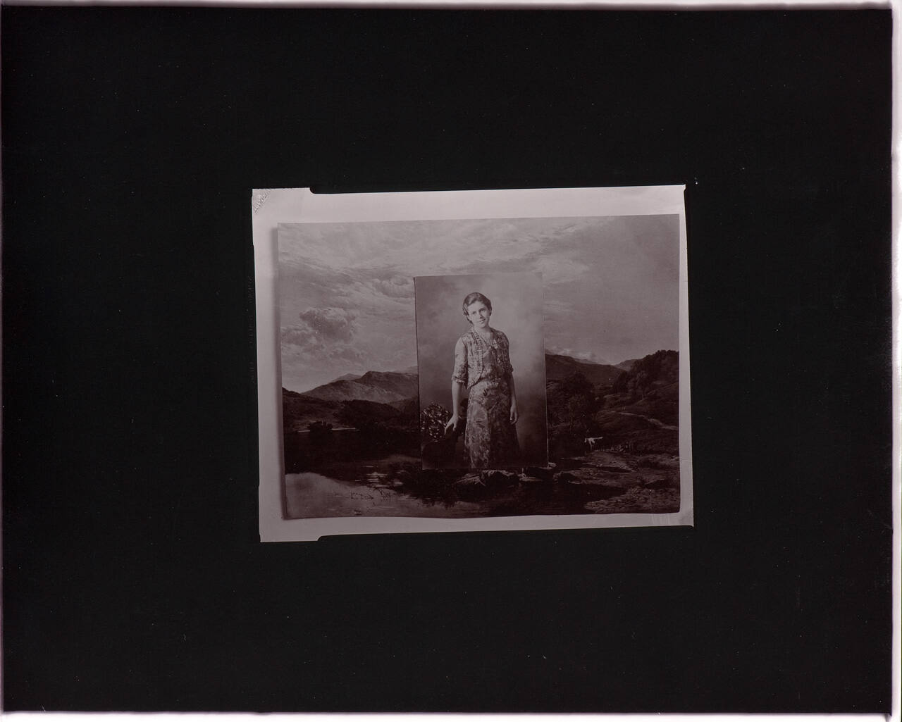 untitled (old photograph of a woman laid on top of painted reproduction of a landscape)