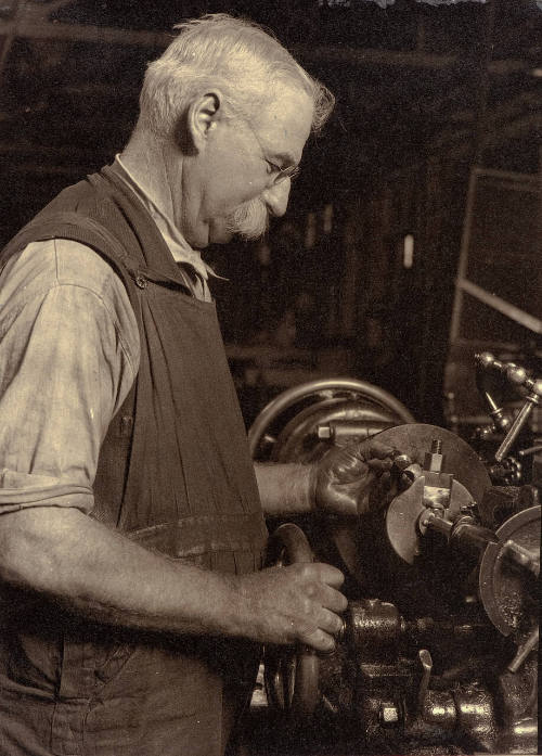 Untitled (man at machine)