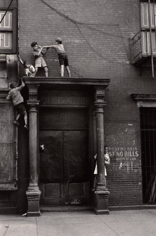 New York (Children Wrestling on Ledge Above Door)