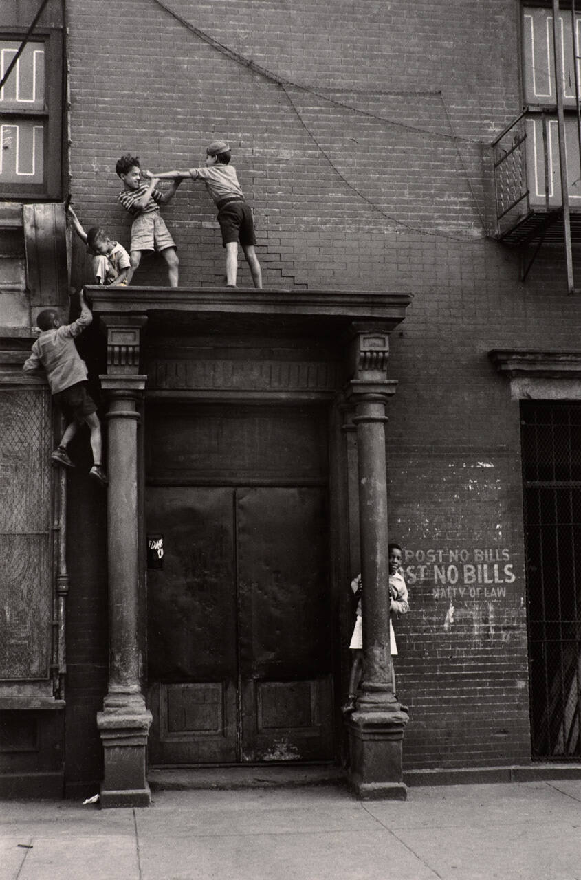 New York (Children Wrestling on Ledge Above Door)