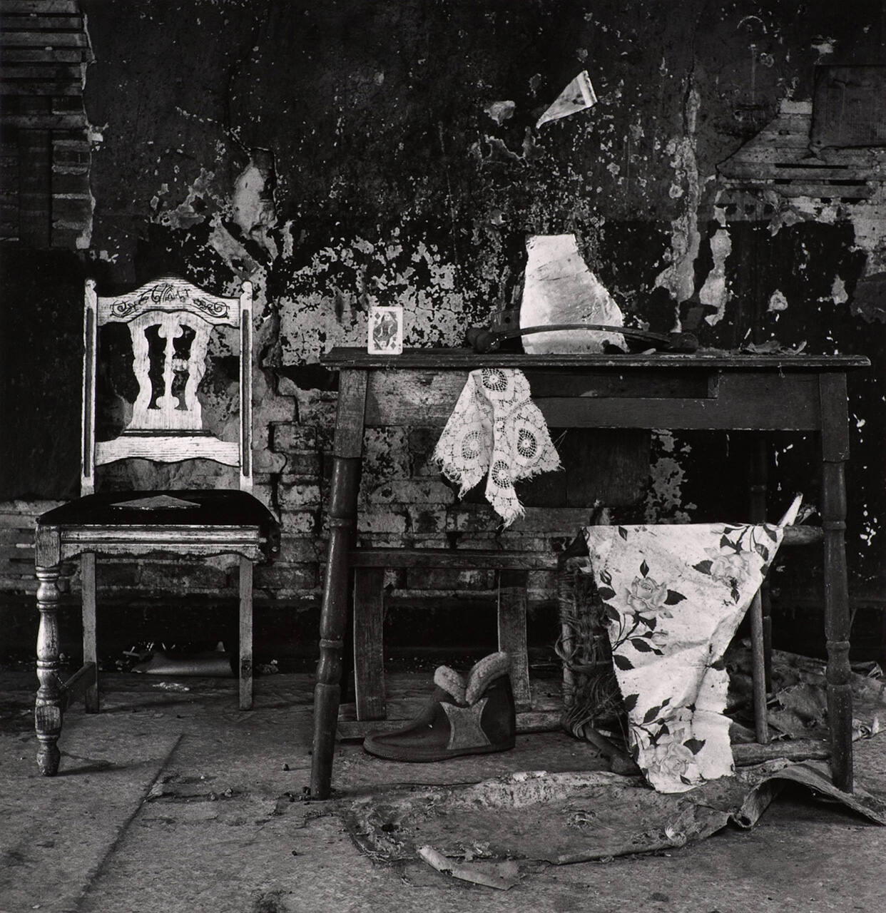 [Interior with chair, table, and card]