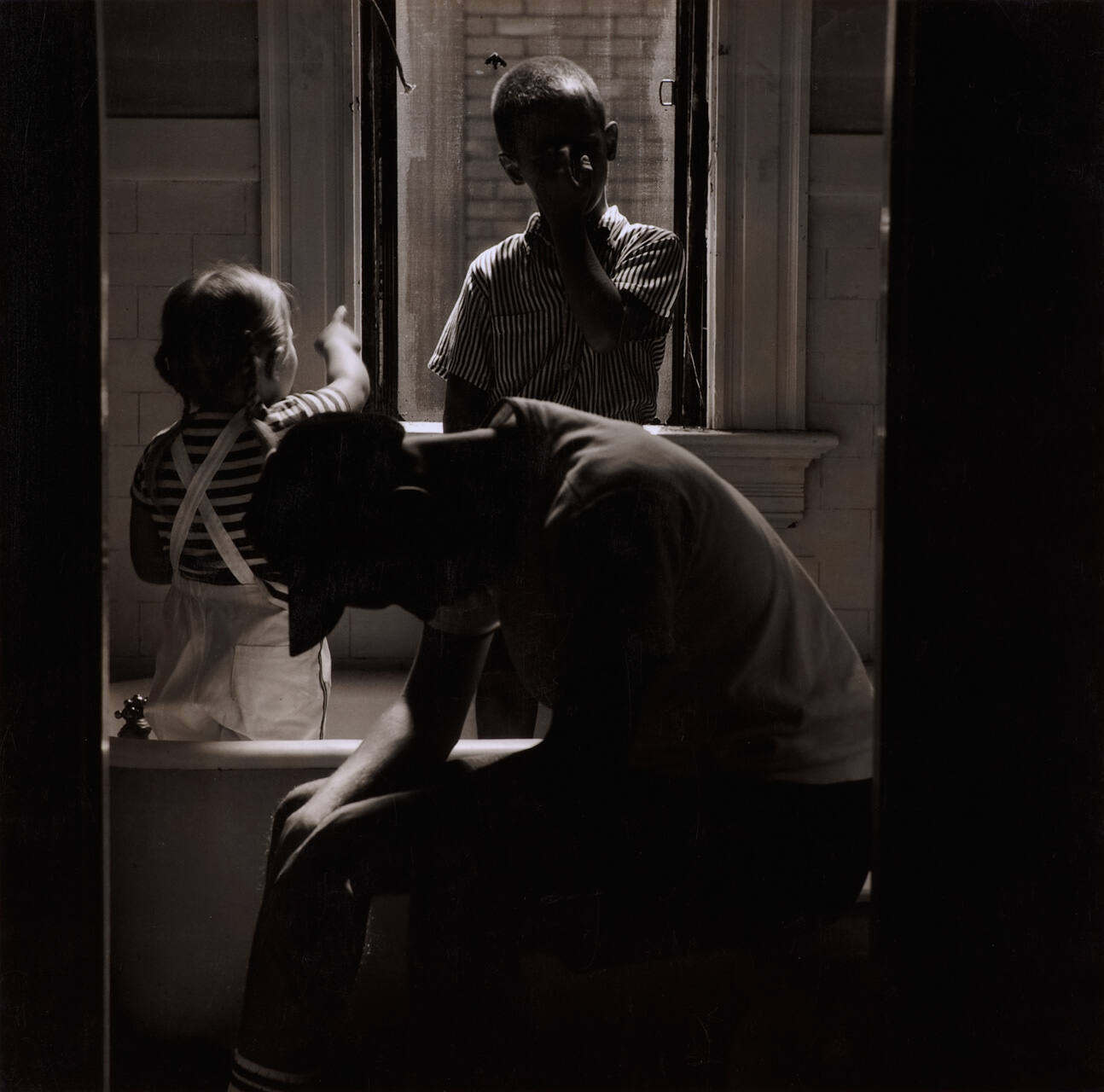 [Three children in interior]