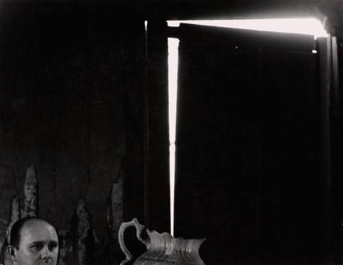 [Beam of light into pitcher]