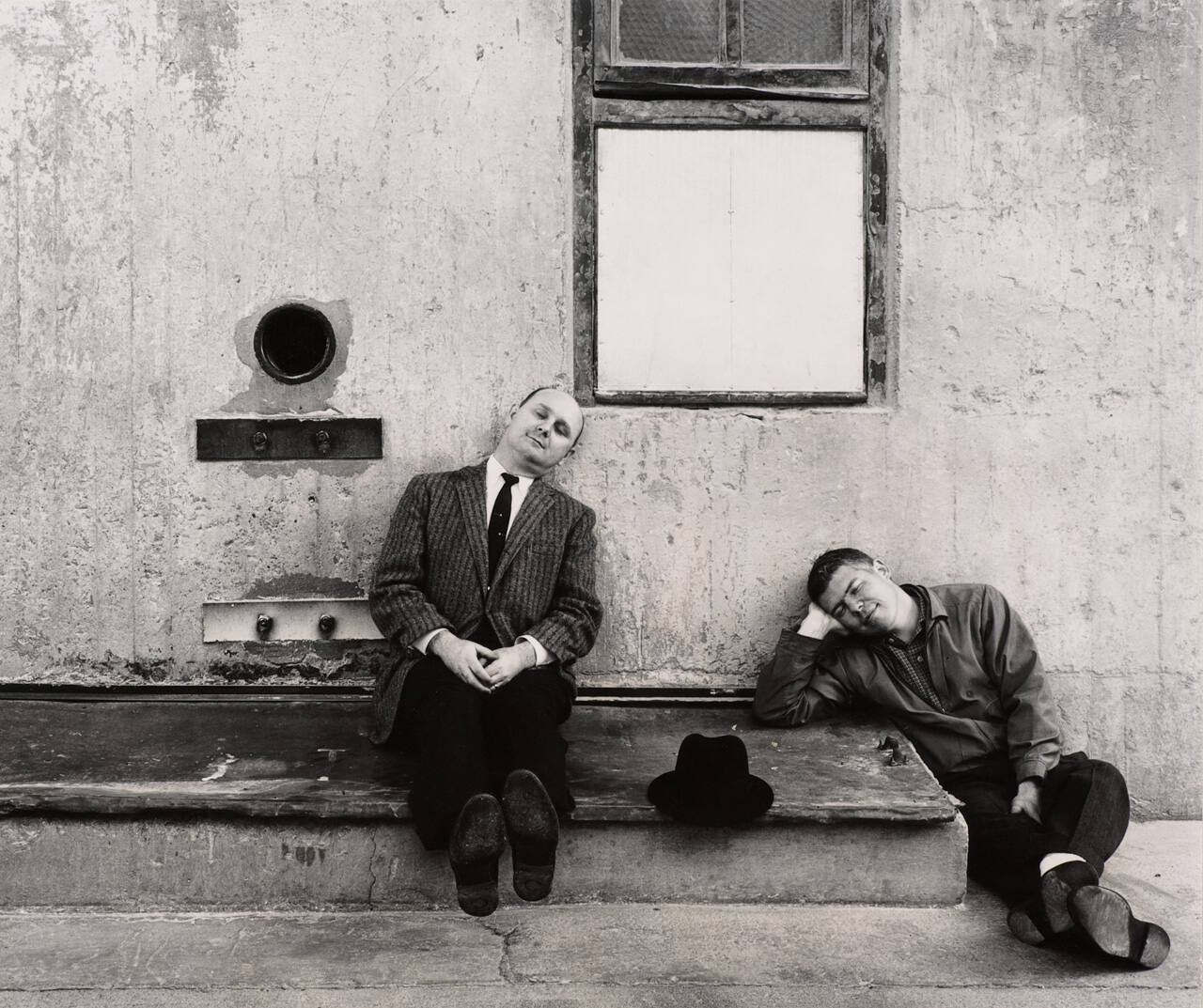 [Two men sleeping]