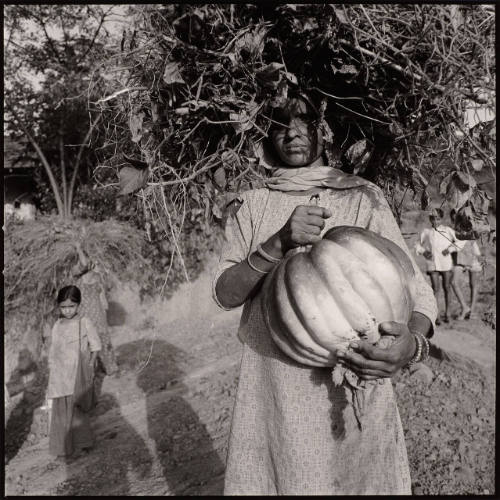 Kulu Valley, India (woman with gourd)