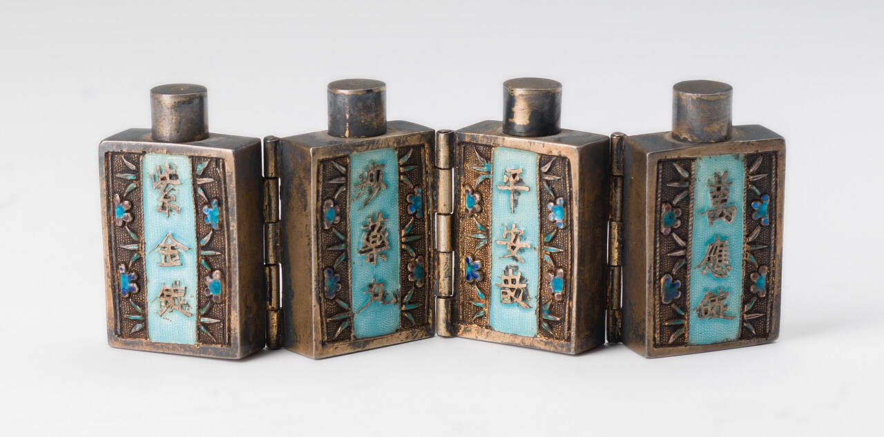 Quadripartite Medicine Container