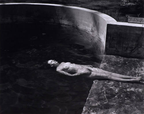 Nude Floating in Pool