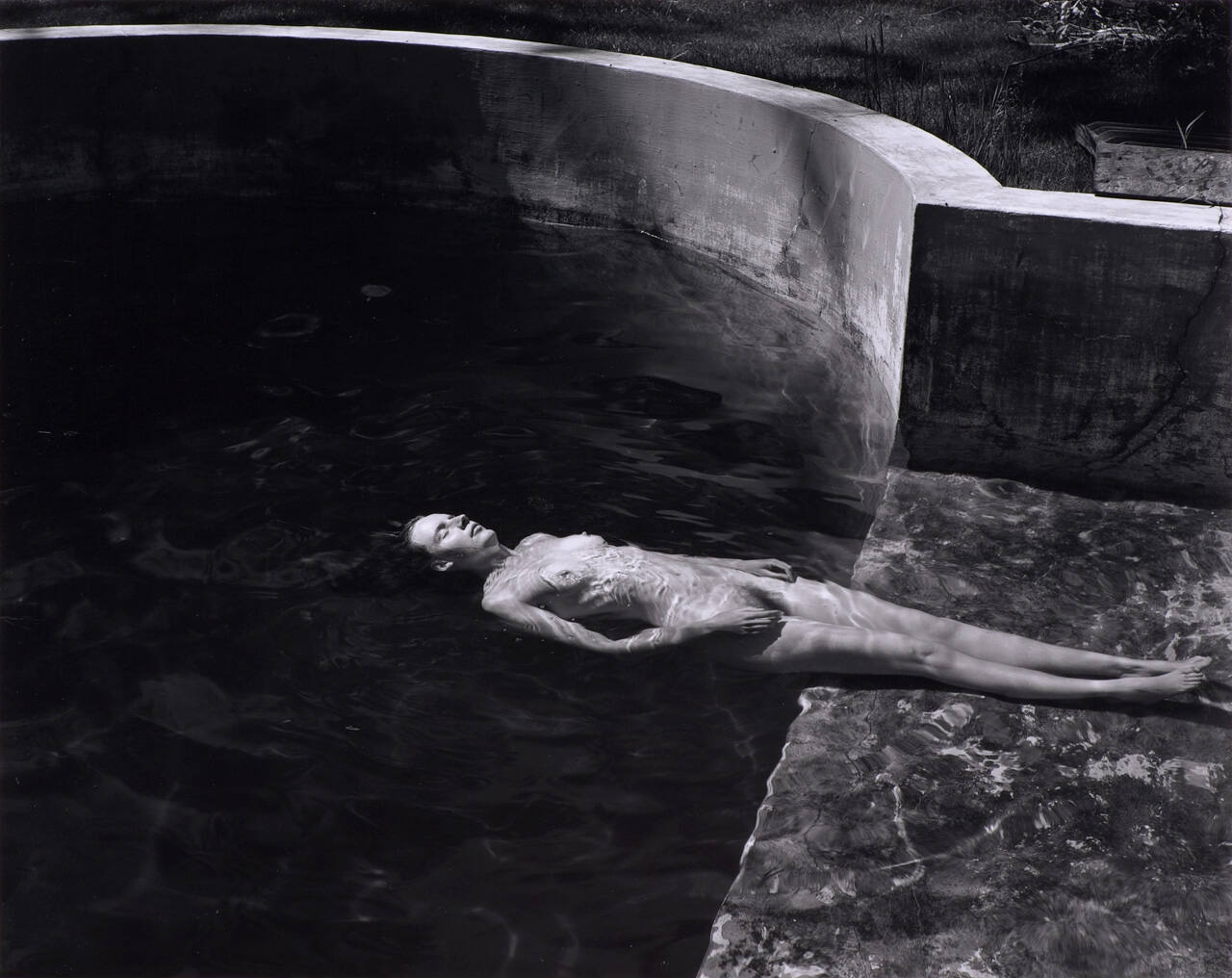 Nude Floating in Pool
