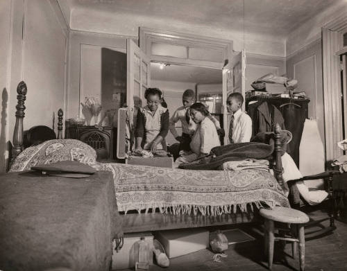 Harlem Family (gathered on bed)