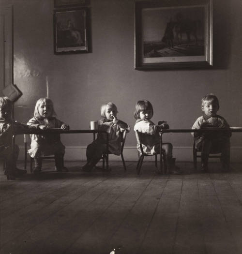 Evacuated children in nursery at tea time, England