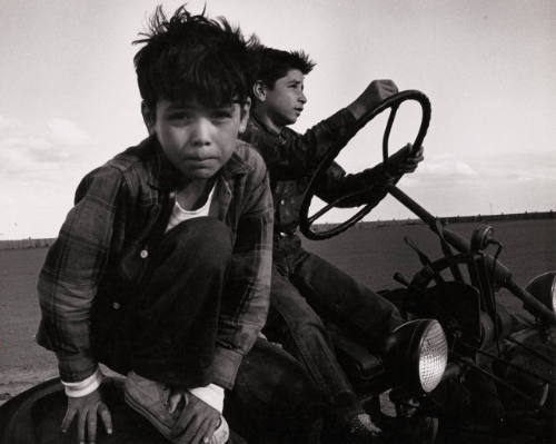 Farm Worker Children Playing on Tractor  [print 1966]