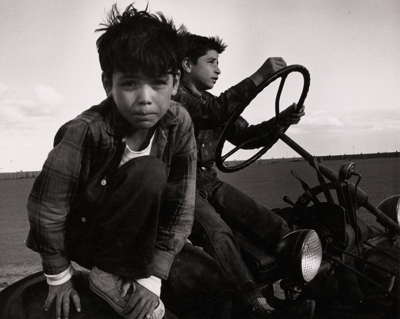 Farm Worker Children Playing on Tractor  [print 1966]