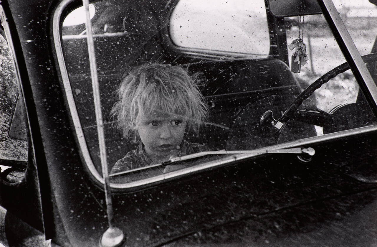 Untitled (Child Seen Through Car Windshield)
