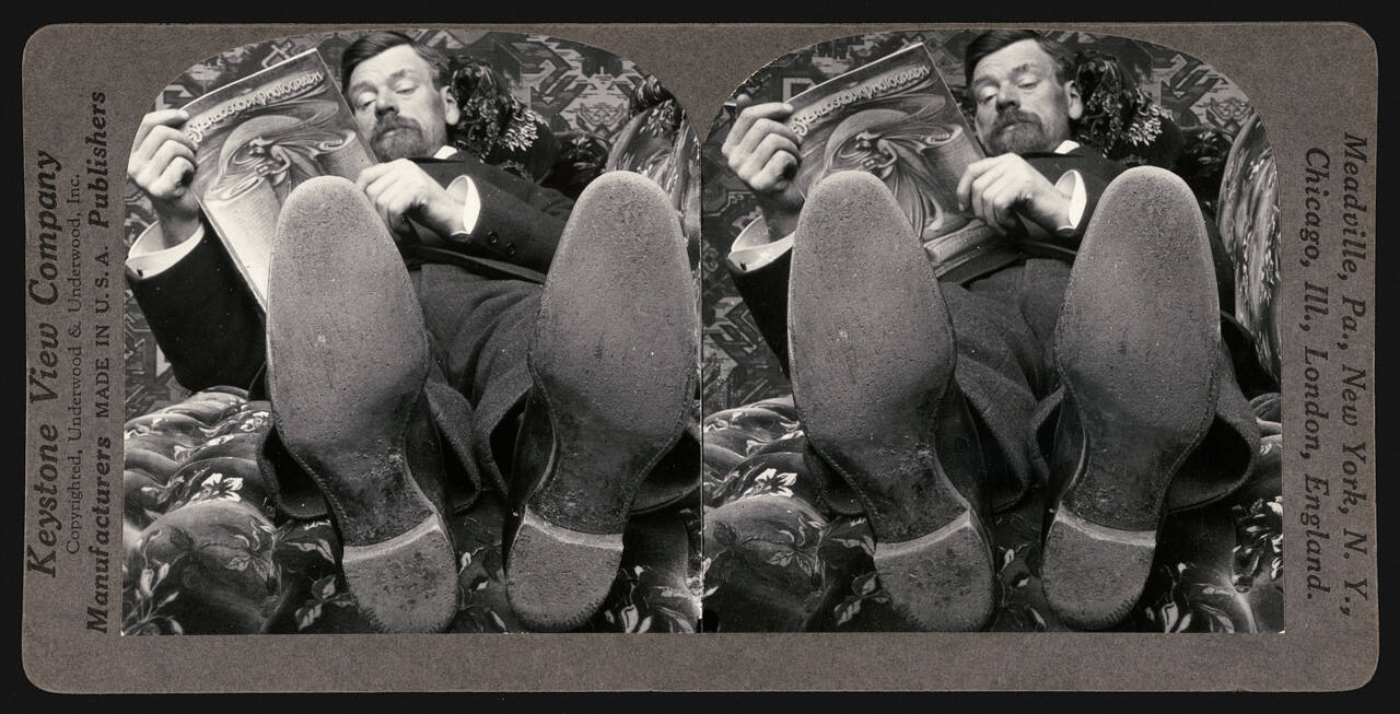 Untitled (Reclining Man reading Stereoscopic Photograph magazine)