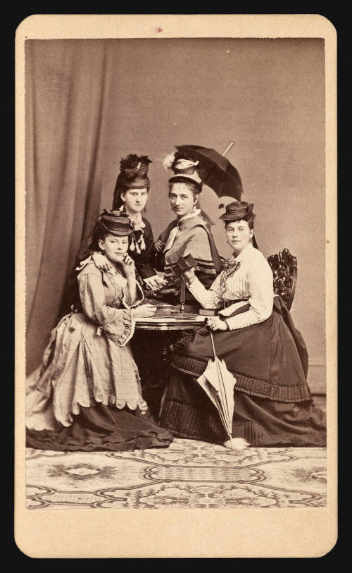 Group of women looking at stereographs