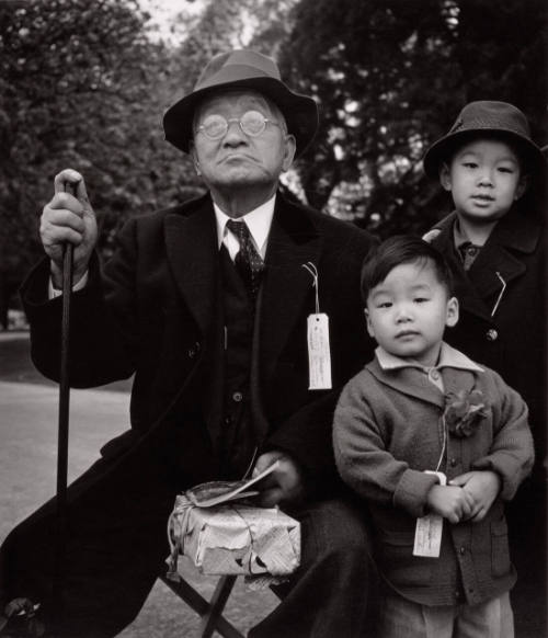 Grandfather and Grandchildren Awaiting Evacuation Bus, Hayward, California