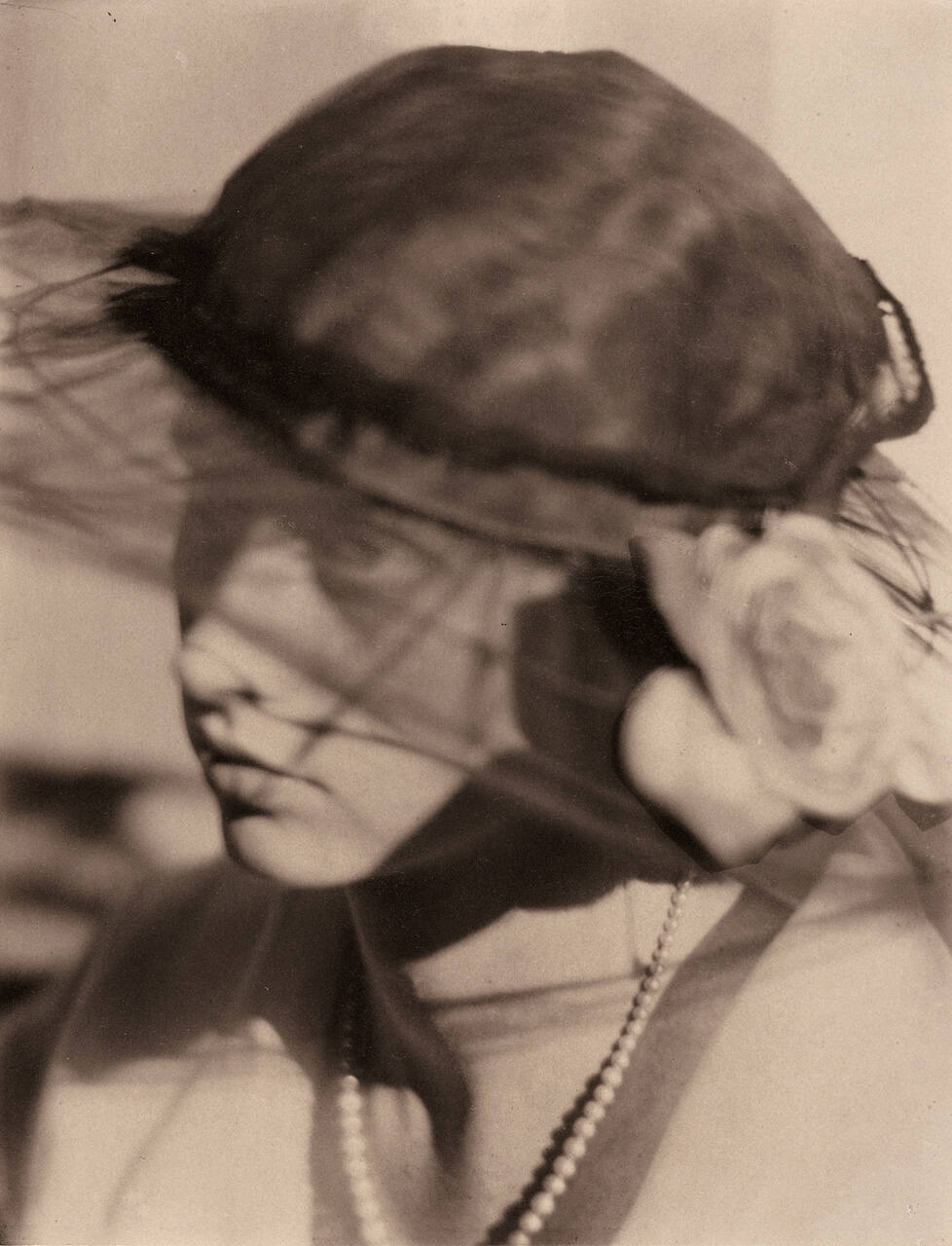 Woman with veiled hat