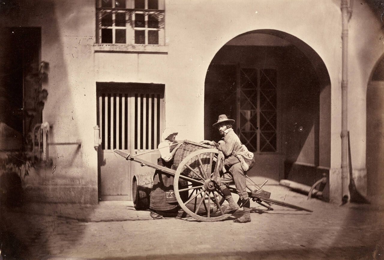 Pifferaro et Femme avec une Charrette au 21 Quai de Bourbon