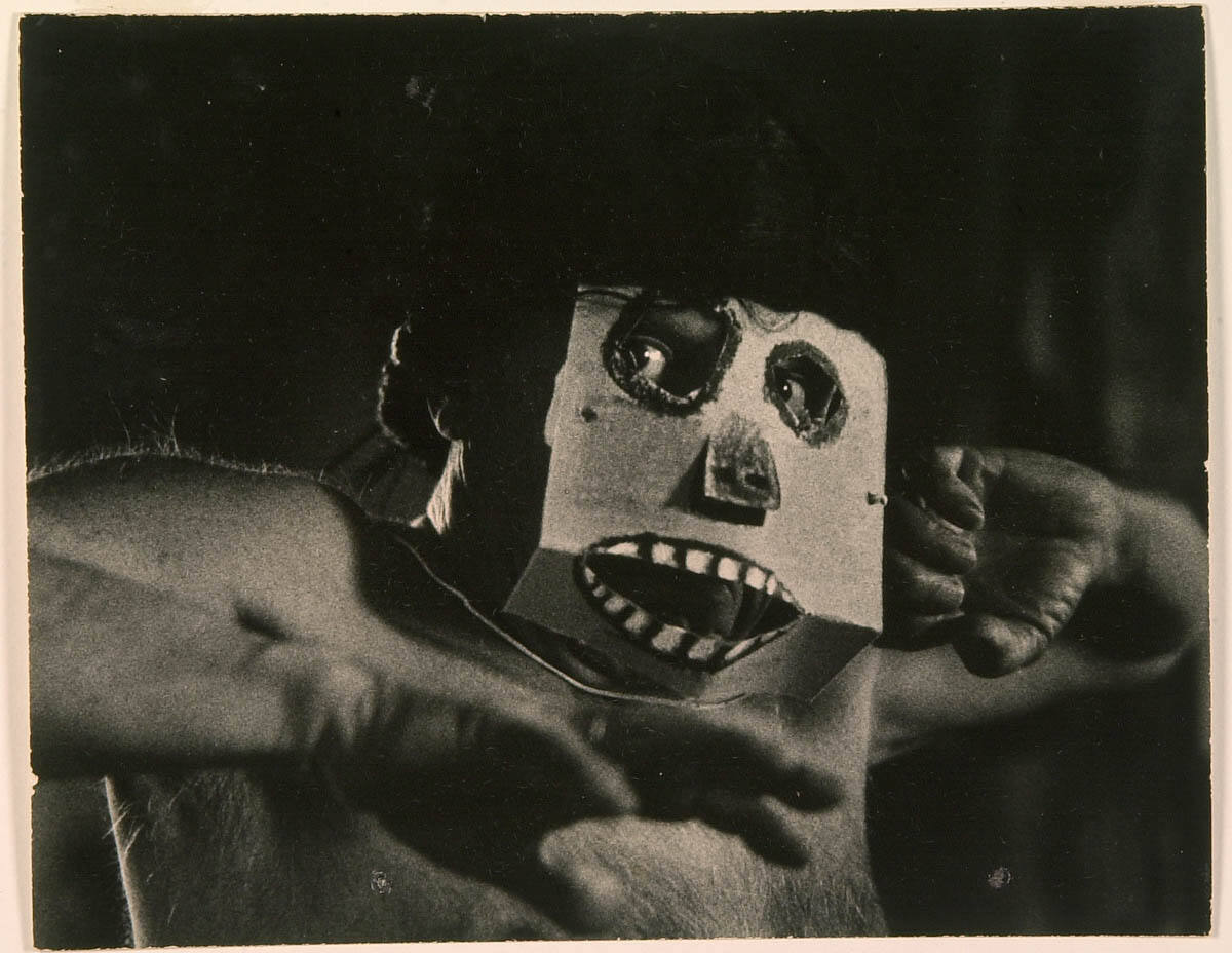 Picasso Wearing Cardboard Mask