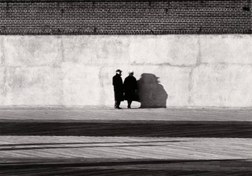 Man and woman with shadows, Coney Island, New York