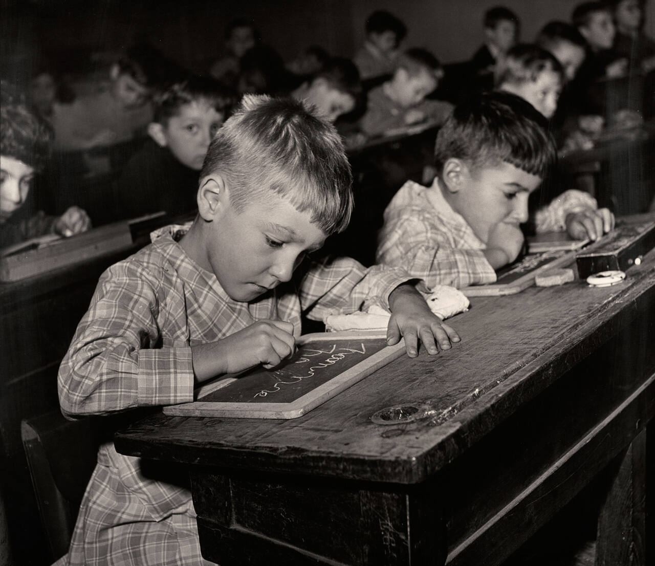 Untitled (Children waiting at desks)