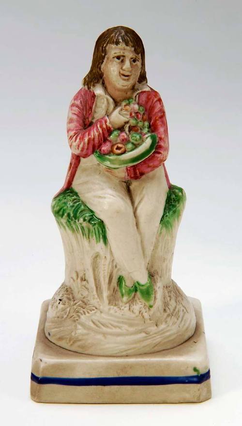 Figure of a Man Seated on a Tree Trunk