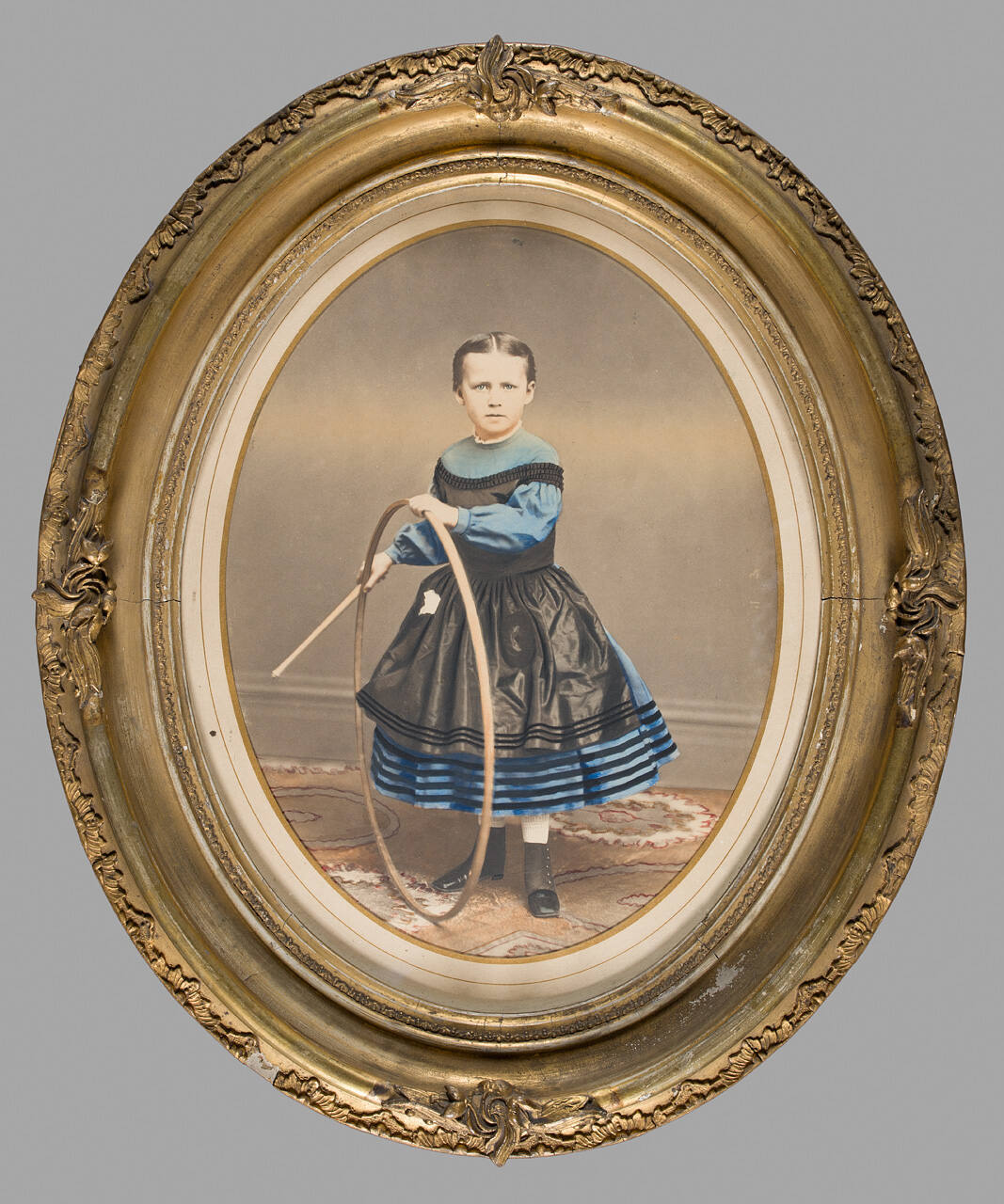 Portrait of Young Girl with Hoop and Stick