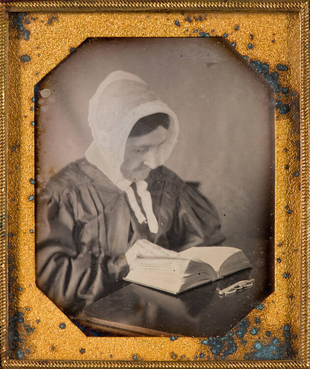 Woman reading Bible