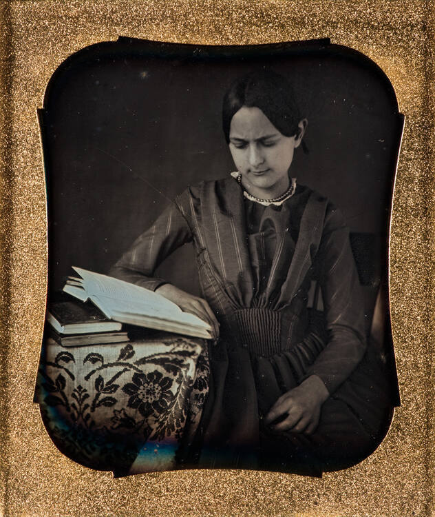 Frowning Girl with Book